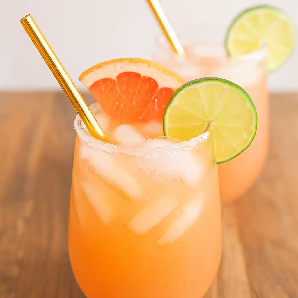 Skinny Paloma Recipe: The Best Light & Refreshing Tequila Cocktail 7 Skinny Paloma recipe served in a highball glass with grapefruit and lime