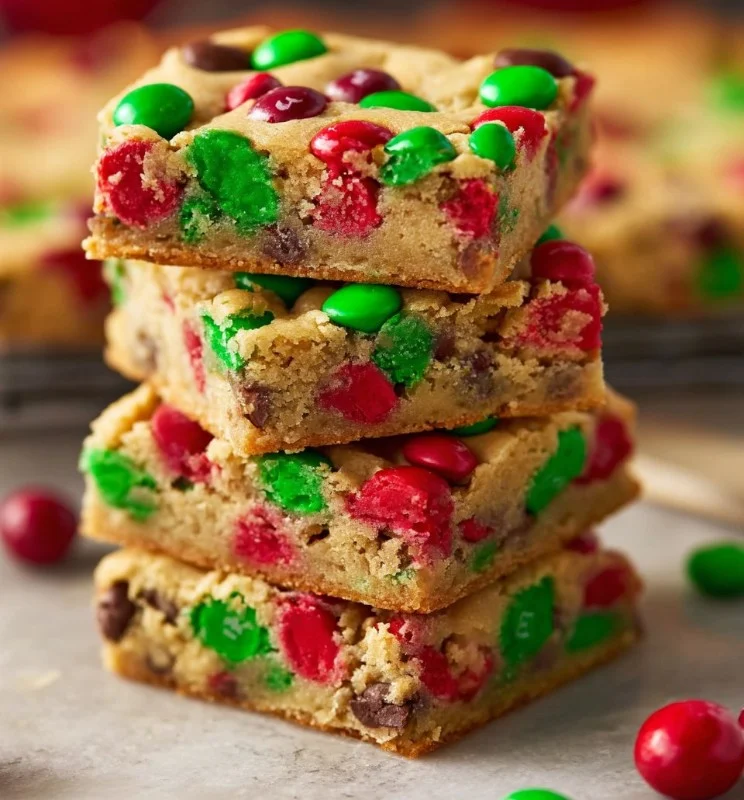 Christmas Cookie Bars 4 Delicious Christmas cookie bars topped with festive sprinkles and chocolate chips.