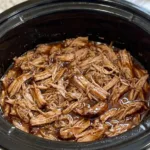 Slow Cooker Kalua Pig 9 slow cooker kalua pig 2026 03 04 071057 572x1024 1